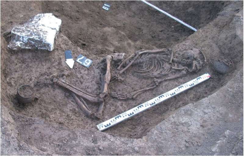 Excavated grave of male skeleton found in the foothills of the North Caucasus.