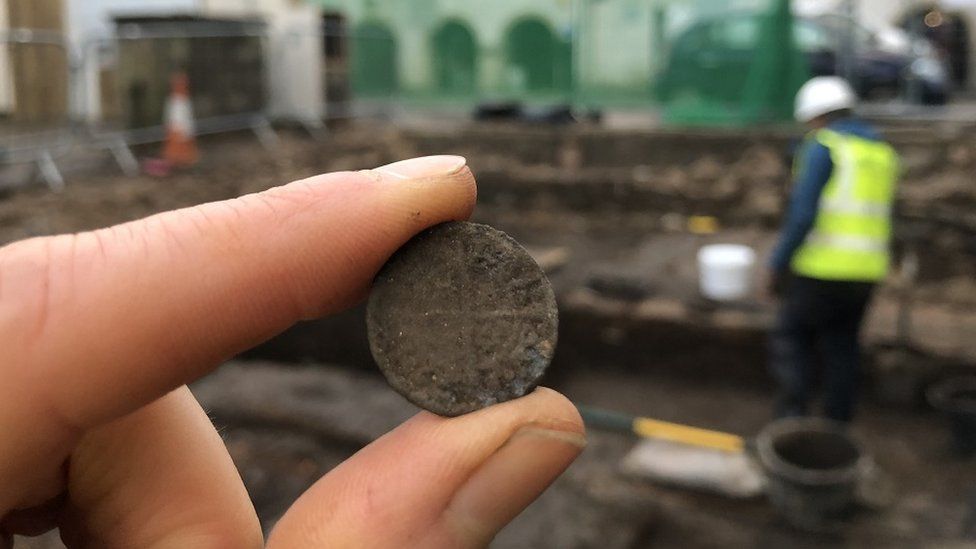 Finds included coins. AOC ARCHAEOLOGY