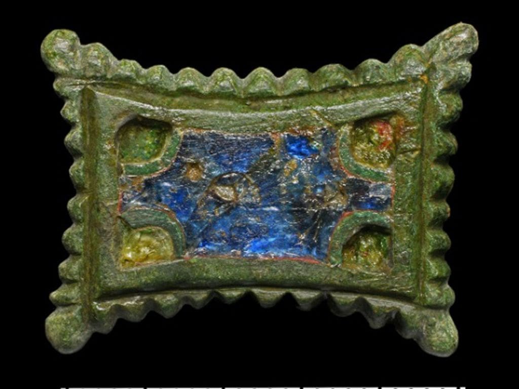 Enameled non-ferrous metal rectangular brooch — clasp with retracted sides from the Carolingian era. (Landesamt fur Denkmalpflege und Archaologie Sachsen-Anhalt, Friederike Hertel/Zenger News)