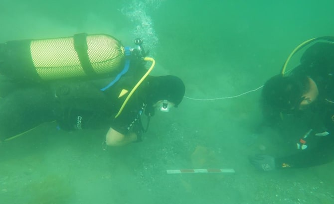 Divers work to mark areas for excavations in the ancient Kerpe Harbor on the Black Sea coast in Kocaeli's Kandıra district, Turkey. (Provincial Directorate of Culture and Tourism via AA)