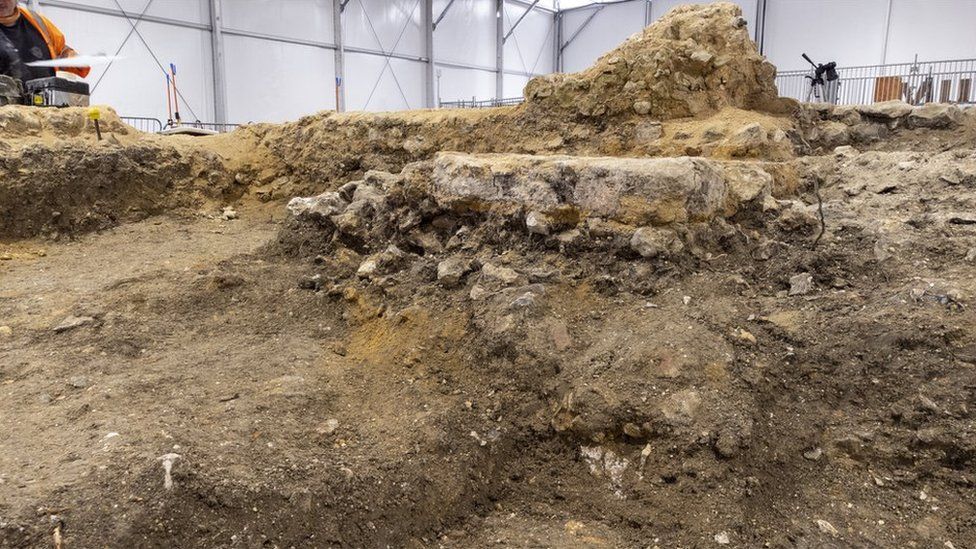 Flint walls found by archaeologists are believed to have formed part of an Anglo-Saxon church