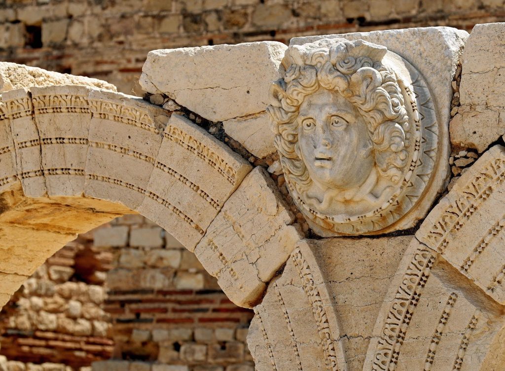 A carved Gorgon head on arches surrounding the Severin forum, in the ancient Roman city of Leptis Magna near the coastal city of al-Khums, Libya. (AFP Photo)