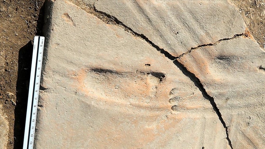 A 1300-year-old baby footprint was unearthed in the ancient city of Assos. Photo: AA