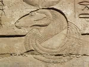 A carving of Khnum Ra on the temple wall.