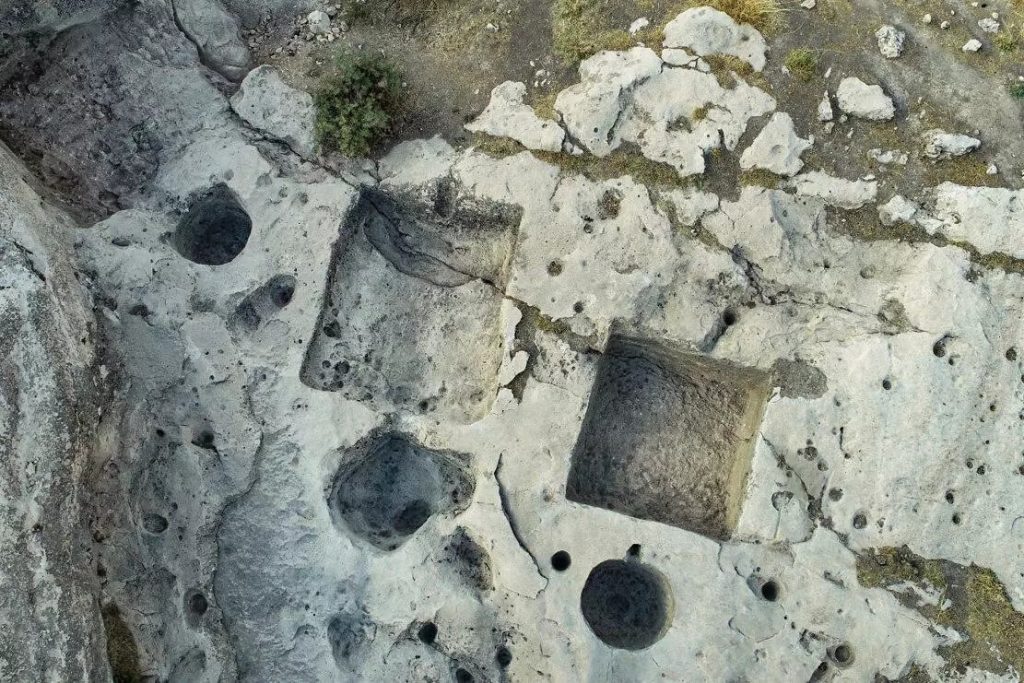 Archaeologists in Iraq also discovered stone-cut pits used to press the grapes and extract the juice, which was then processed into wine - Terra Di Ninive/AFP