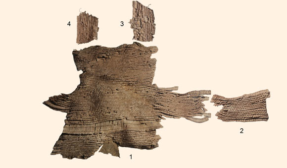 The Yanghai leather scale armor, main fragments outside, view of scales: (1) front cover with remains of attached side panels; (2) end of proper left side panel; (3 and 4) shoulder flaps. Photo: D.L. Xu / P. Wertmann / M. Yibulayinmu.