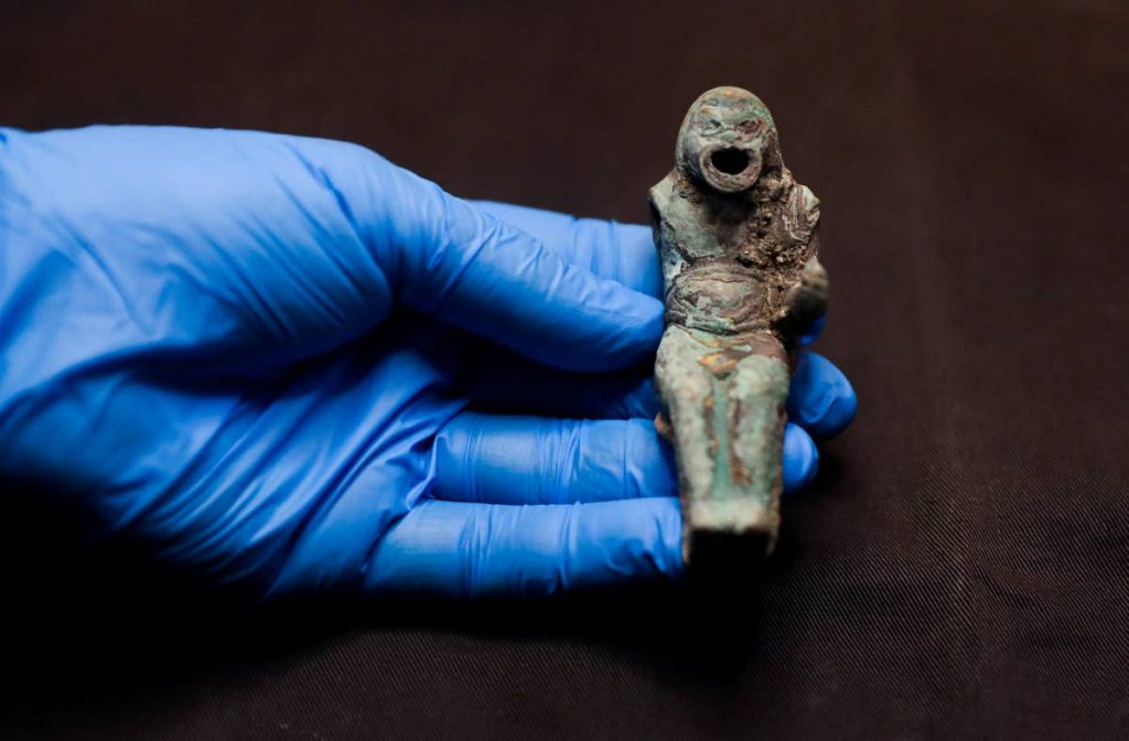 A statue of a masked mime discovered by the Israel Antiquities Authority marine archaeology survey off the coast of Caesarea. Photo: Ohad Zwigenberg