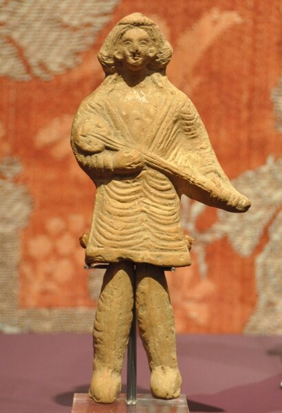 Lute player statue from the time of the Parthian Empire, kept at the Netherlands's Rijksmuseum van Oudheden.