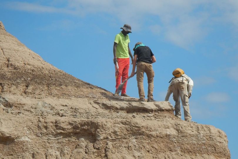 The researchers who conducted the study at an archaeological site (Image: Al Deino/SWNS)