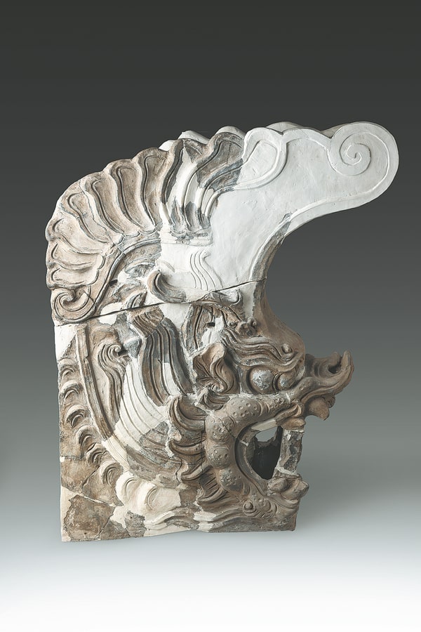 Cultural relics on exhibition at the Taizicheng site include a chiwen, or imperial roof decoration.