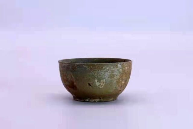 Small bowl containing tea residue found in Tomb No. 1 at Xigang