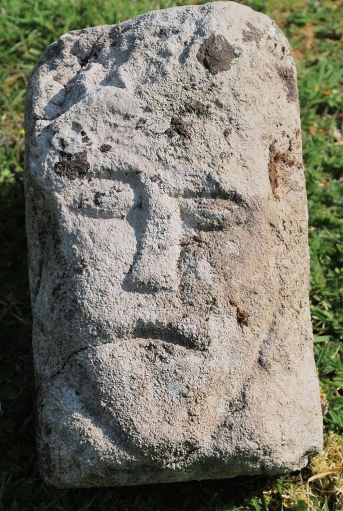 The carved stone is believed to have been part of an ogee window that was part of a 13th-century church on the site.