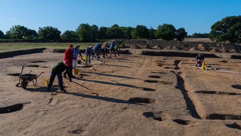 Volunteers working with Suffolk County Council fully excavated post holes on the east side of the hall. Photo: Graham Allen