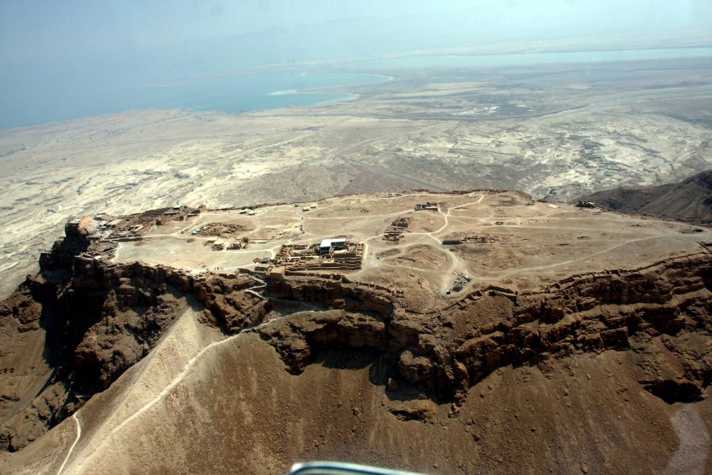 An aerial view of the Masada Mountain in the desert near the Dead Sea.