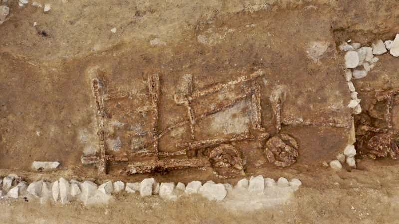 Buried wooden vehicle parts. Photo: Xinjiang Institute of Cultural Relics and Archaeology