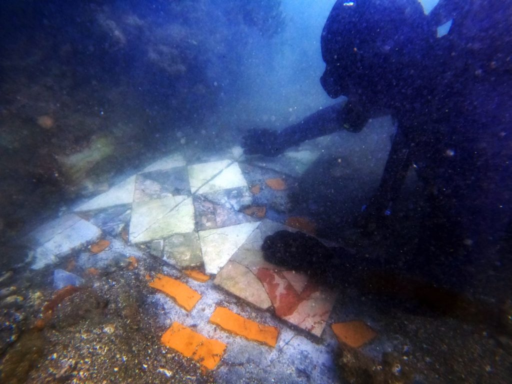 A large section of opus sectile (marble inlay) flooring was also discovered.