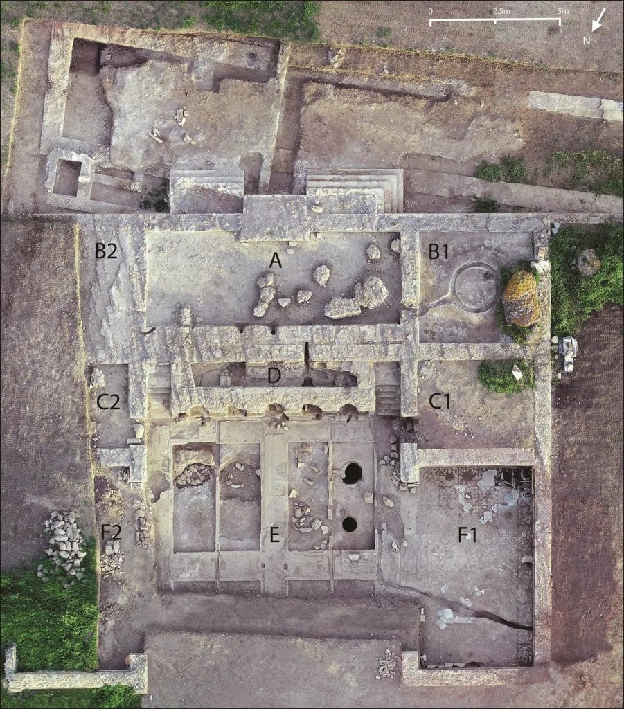 Aerial view of the excavated vineyard at the Villa of the Quintilii. Production areas are at the top (A–D), and the basement (E) with adjoining dining room (F) in the lower half of the picture.