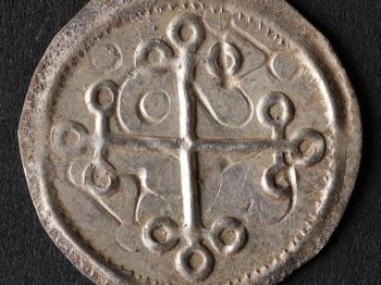 The sign of the cross helped scientists to date the coins. Photo: Nordjyske Museer