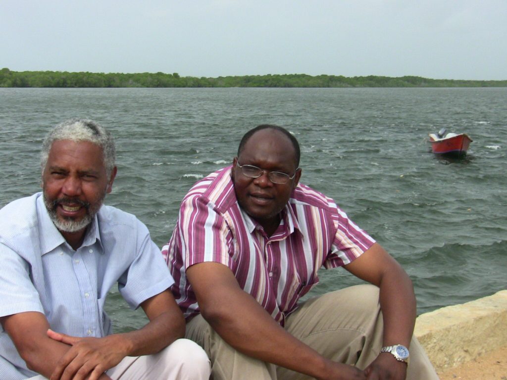 University of South Florida anthropologist Chapurukha Kusimba (right) sits aboard a Swahili coastal boat beside longtime colleague Mohamed Mchulla Mohamed, curator emeritus of the National Museums of Kenya. Photo: Chapurukha Kusimba, University of South Florida