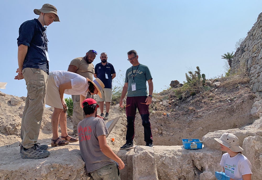 The Deputy Chief of Mission of the U.S. Embassy in Malta, Angela Cervetti, visited the archaeological excavation site to meet USF students and USF IDEx staff members to learn more about the dig and their role in the international research project. | Photo by: Davide Tanasi