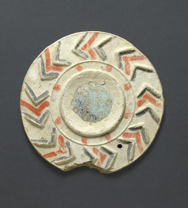 An almost complete mirror plate used as a demonstration. Previously found in a Nitsana excavation. Photo: Clara Amit, Israel Antiquities Authority