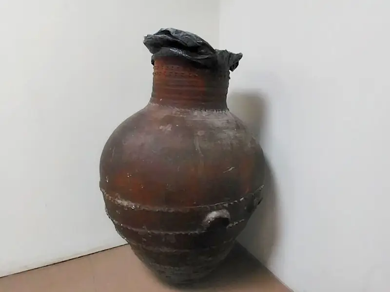 A Medes-era clay pot used as a trash bin in the Rasht Museum. Photo: Etemad Newspaper 