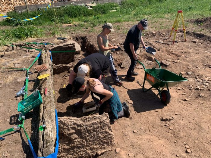 Archaeologists excavate the Tiarp stone burial chamber. Photo: University of Gothenburg. 