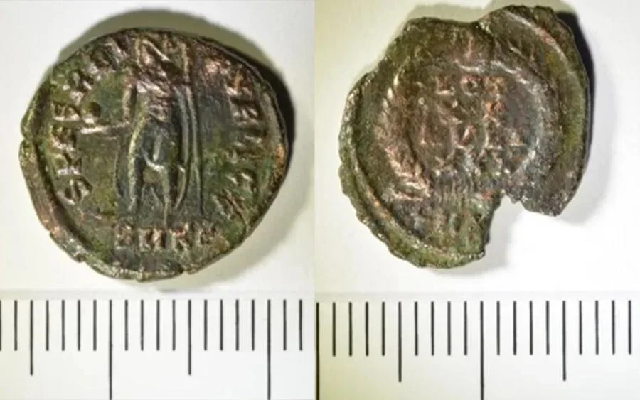 Two of the coins unearthed at the site. The majority of the coins discovered date back to the reign of Constantius II. Credit: Scott Gallimore