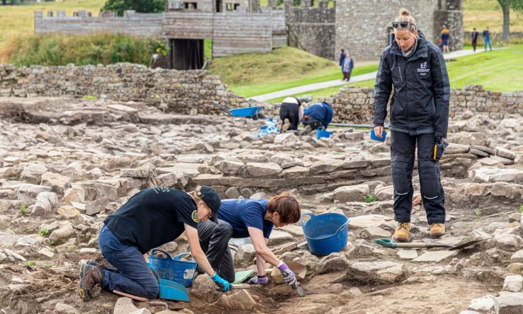 Archaeologists digging at Vindolanda Roman garrison site in Northumberland, where the remains of the common bedbug were found. Photo: Stephen Dorey