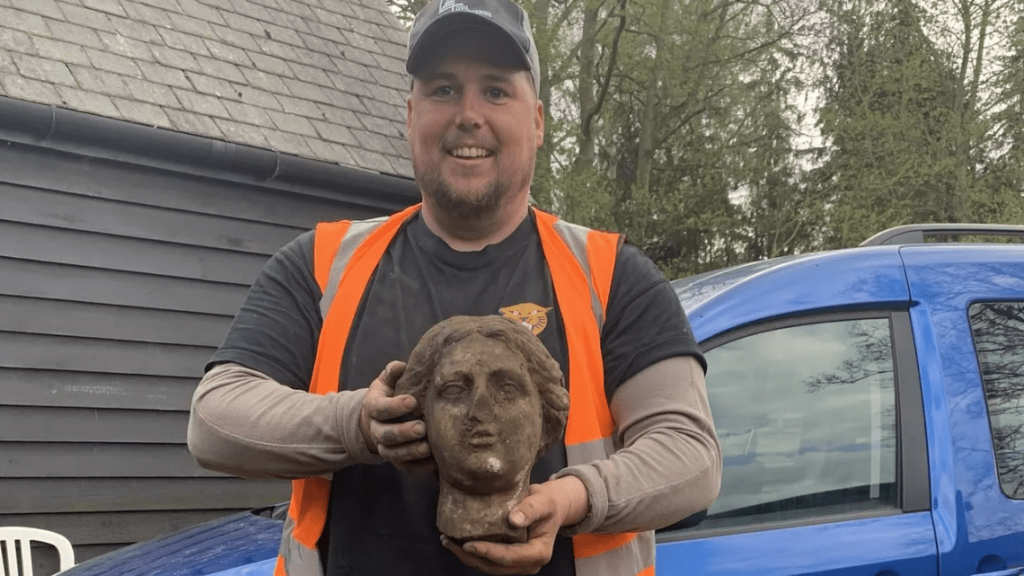 Greg Crawley accidentally discovered a “mysterious” 1,800-year-old Roman statue while using a digger during parking lot construction in the United Kingdom, according to Burghley House officials. Photo: Burghley House