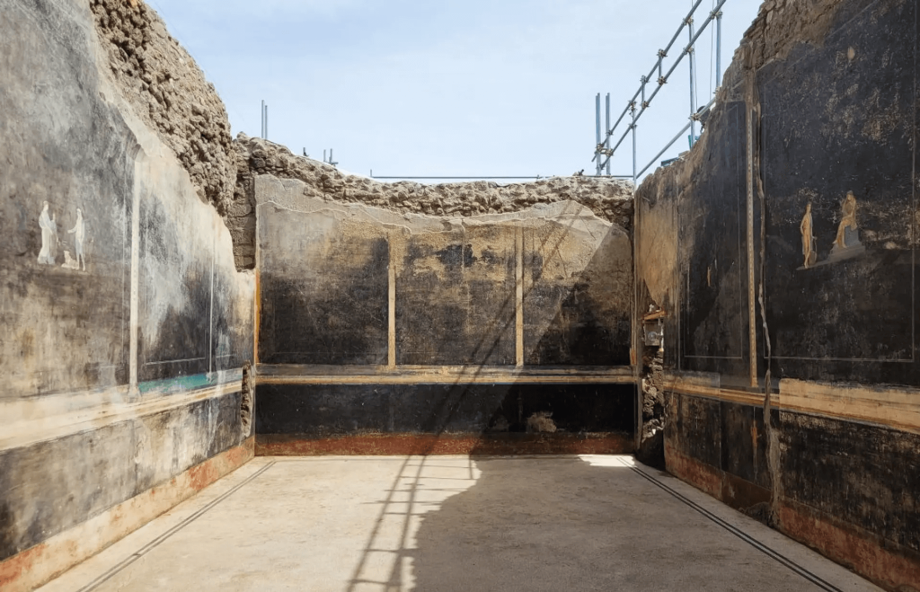 The frescos have been discovered in the 'black room', an 'imposing' banquet hall with elegant black walls at a former private residence along Via di Nola. Photo: Archaeological Park of Pompeii