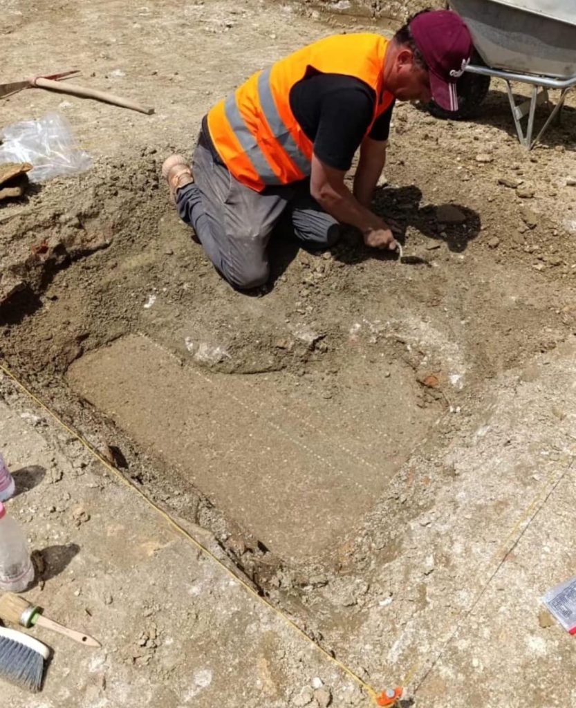 An archaeologist excavates a 1,600-year-old indoor pool at an ancient Roman villa in Durrës. Photo from Albania’s National Institute of Cultural Heritage