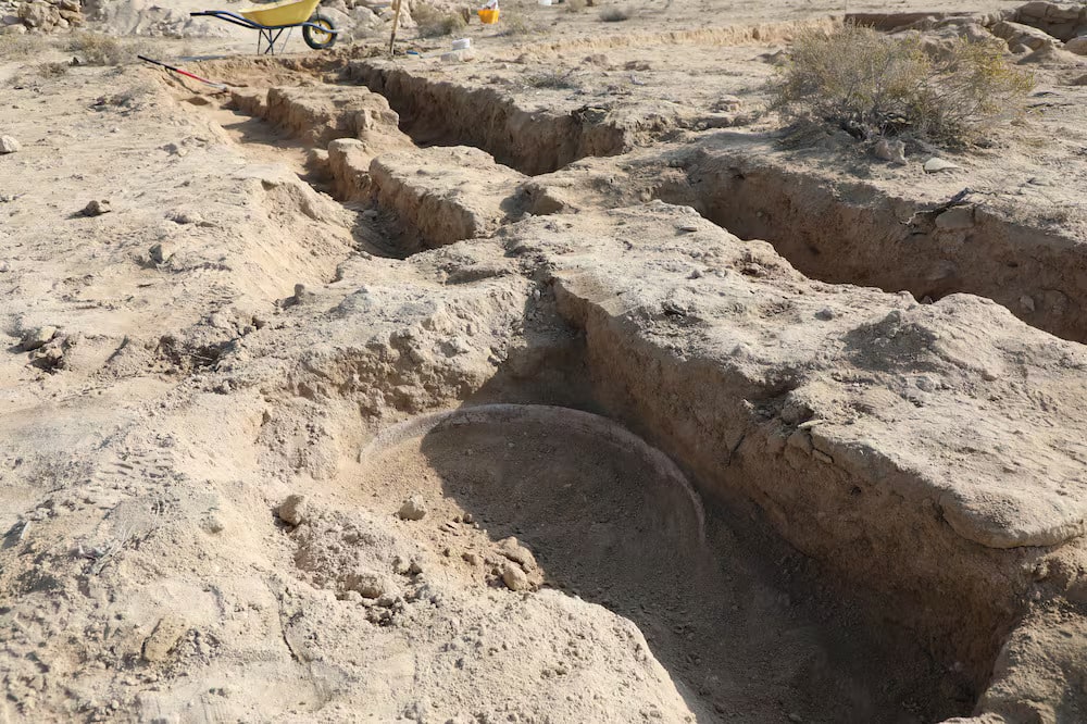 
A jar popped out from the soil. Experts believe this may have been one of the tanner ovens or used for storage. Photo: Umm Al Quwain Department of Tourism and Archaeology