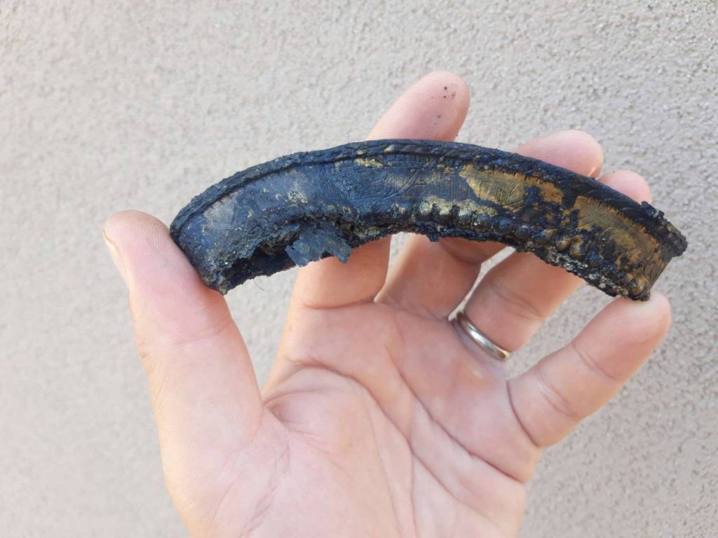 One of the most well-preserved trumpets found at the shipwreck. The brass artifact has the inscription “LVGDVNY BATAVORVM,” the Latin name for Leiden, the Netherlands. Photo: International Center for Underwater Archaeology in Zadar