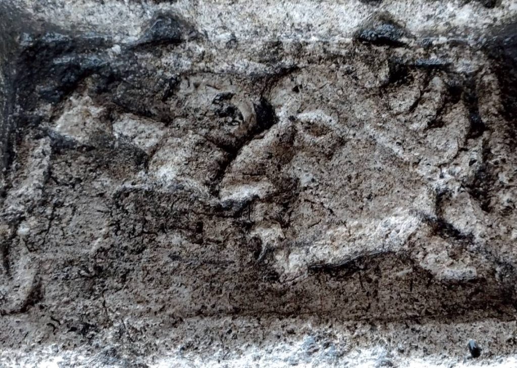 
A Gaul being beheaded by a Roman sword surrounded by vines was carved into the stone. Photo: French National Institute for Preventive Archaeological Research (INRAP)