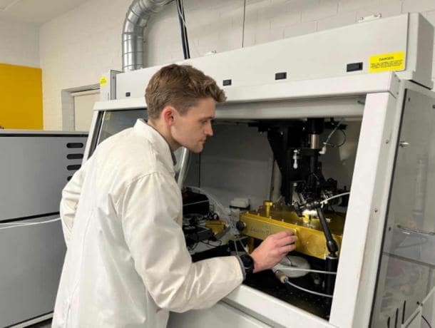 Curtin PhD candidate Anthony Clarke studying samples in the lab. Photo: Curtin University/Nature