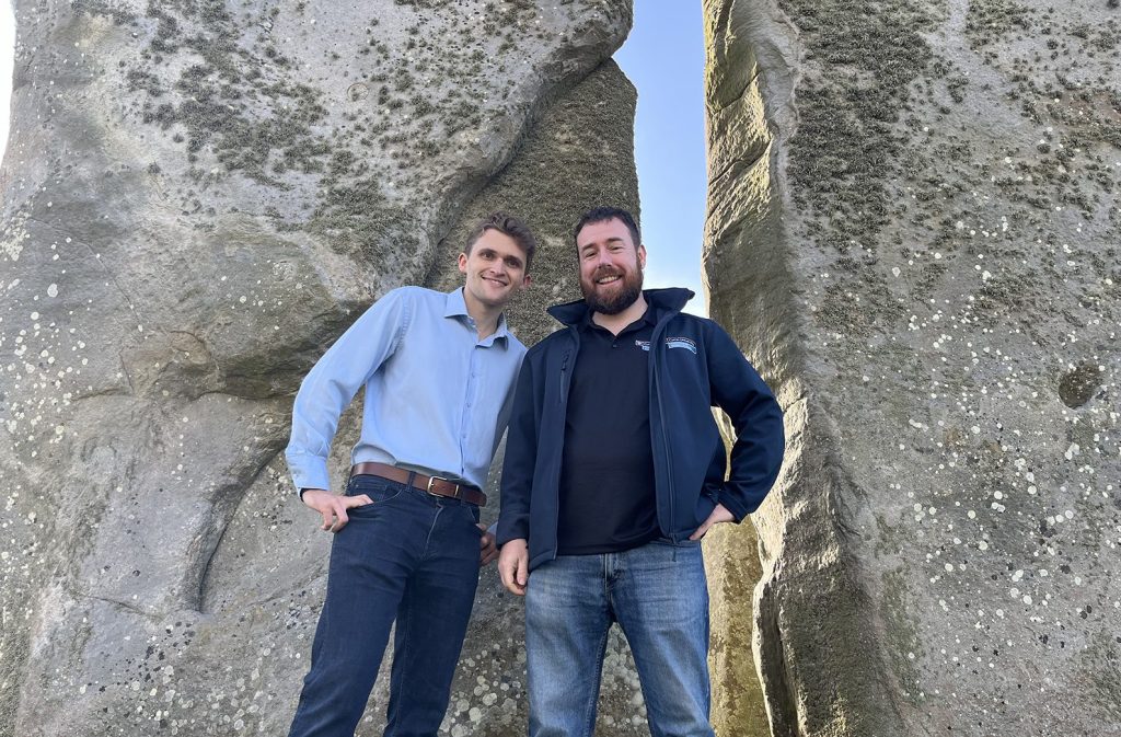 Curtin University PhD student Anthony Clarke and Professor Chris Kirkland at Stonehenge. Photo: Curtin University