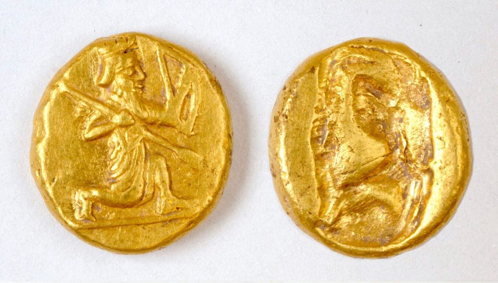 The coins show a figure of a kneeling archer, the characteristic design of the Persian daric, a type of gold coin issued by the Persian Empire Photo: Notion Archaeological Project, University of Michigan