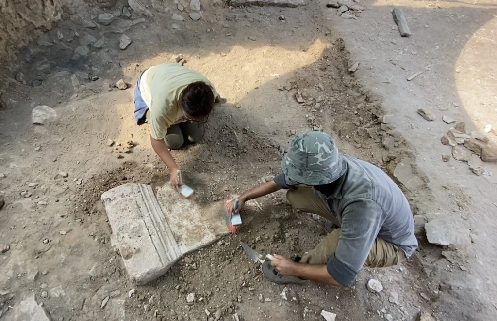 The teams, who continue their excavations regularly every year in the ancient city of Anemurium, found an inscription consisting of 13 lines honoring a wrestling athlete of the period, which is considered to date back 2,000 years for the first time in the Port Bath during the excavations in 2024, Türkiye. Photo: IHA