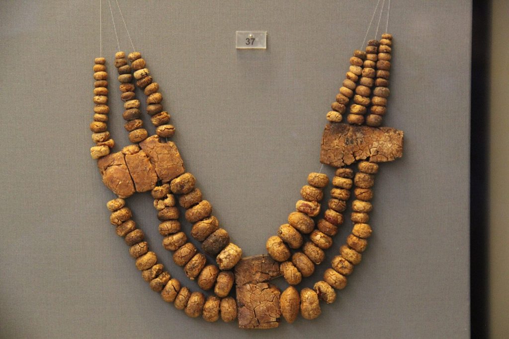 Mycenaean amber necklace. Greek Prehistory Gallery, National Museum of Archaeology, Athens. Photo: Gary Todd