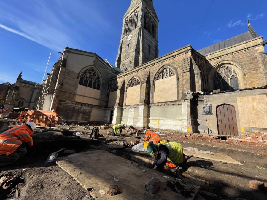 Archaeologists carry out excavations at Leicester Cathedral. Image Credit: Mathew Morris / ULAS