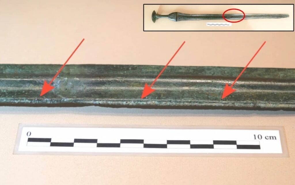 Image of the sword from Lloseta and detail of the burrs on the edge of the blade. Image Credit: Archaeology Museum of Catalonia