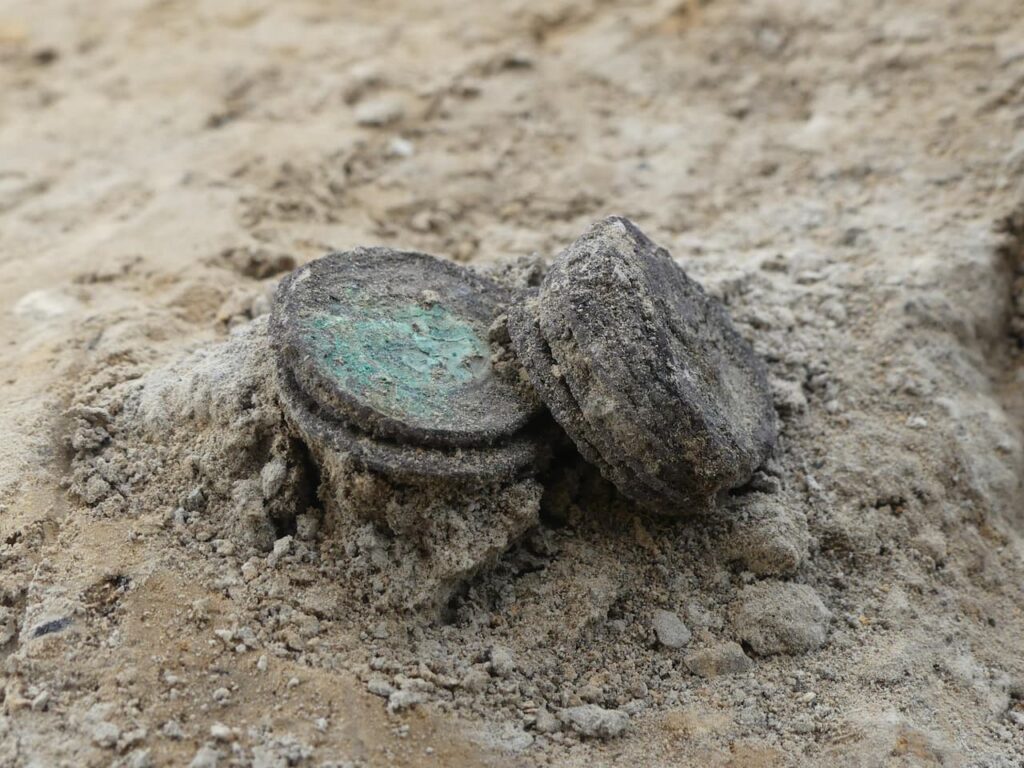 Carolingian coins discovered at the site. Credit: Coline Herbert / INRAP