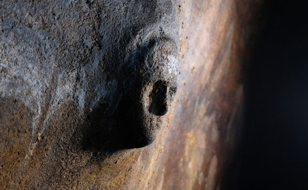 Mask in a cistern. Credit: Anna Tomkowska