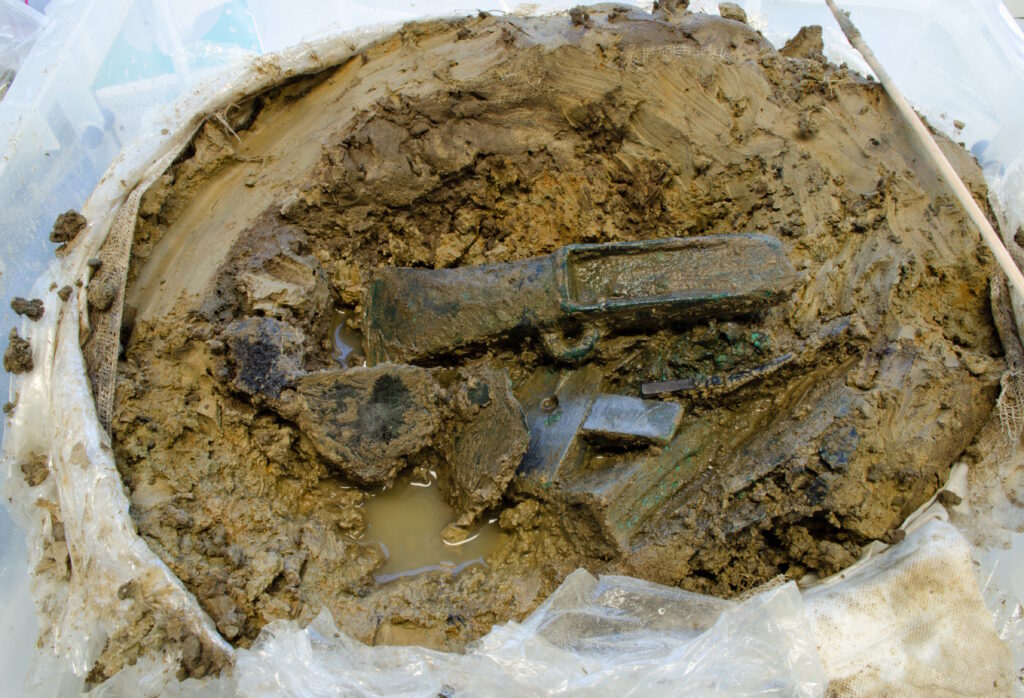 
Archaeologists transported the remaining hoard in a single soil block to the British Museum for micro-excavation under controlled laboratory conditions to ensure careful analysis.