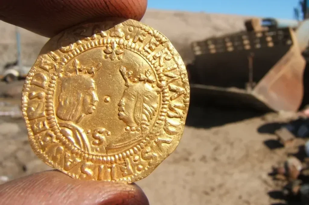 The coins were in mint condition which Dr Noli believes is down to the treasure chest being buried under the ship's huge structure. Credit: Dieter Noli