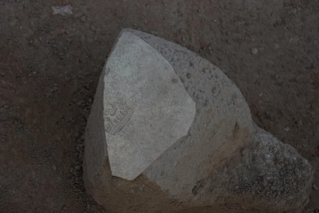 Pottery fragment dating bact to 7th-9th AD bearing stamp of a gazelle indicating the maker. Credit: KUNA