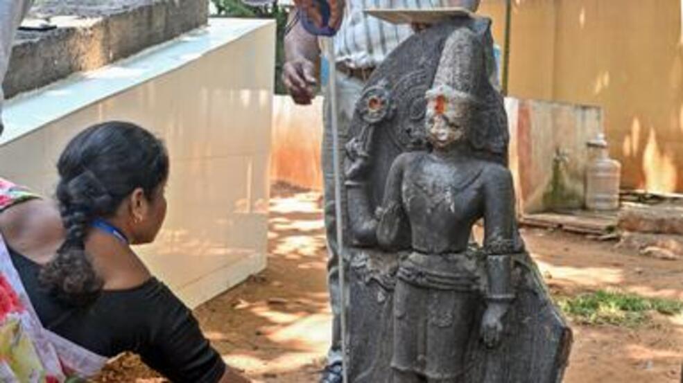 The 3.1 feet idol of Lord Vishnu being inspected at the Visakha Museum in Visakhapatnam on Saturday. Credit: K R DEEPAK