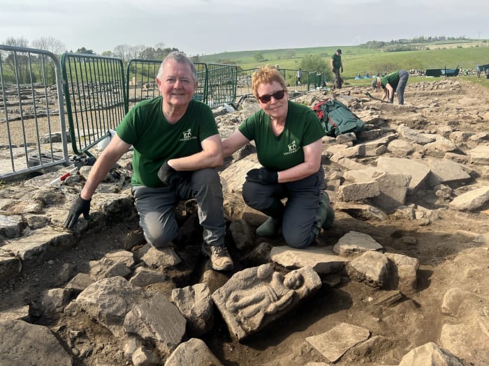 Jim and Dilys Quinlan uncovered the Victory relief during their 21st excavation season at Vindolanda. Credit: The Vindolanda Trust