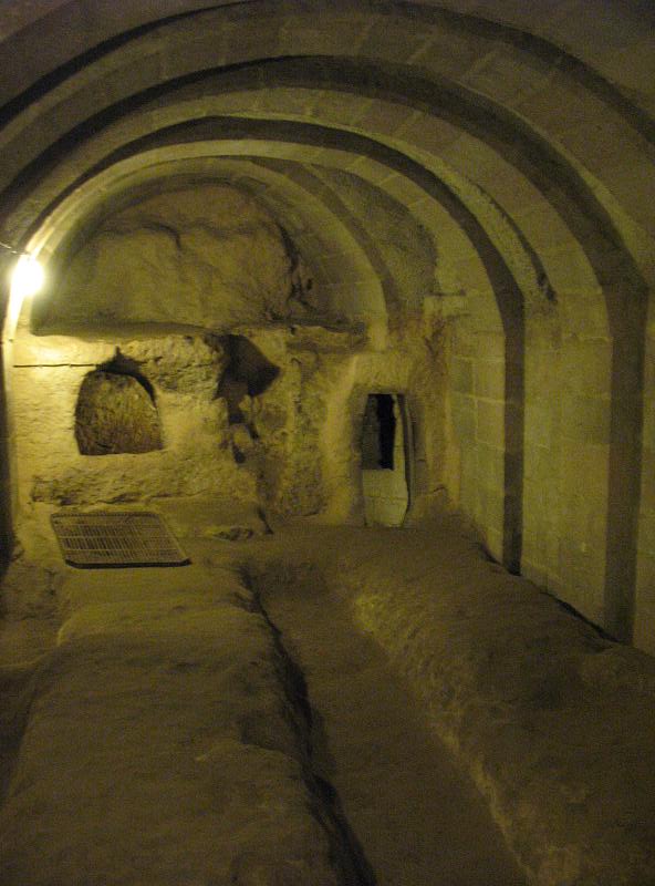 The room with the barrel-vaulted ceiling, possibly a school. Credit: Public Domain
